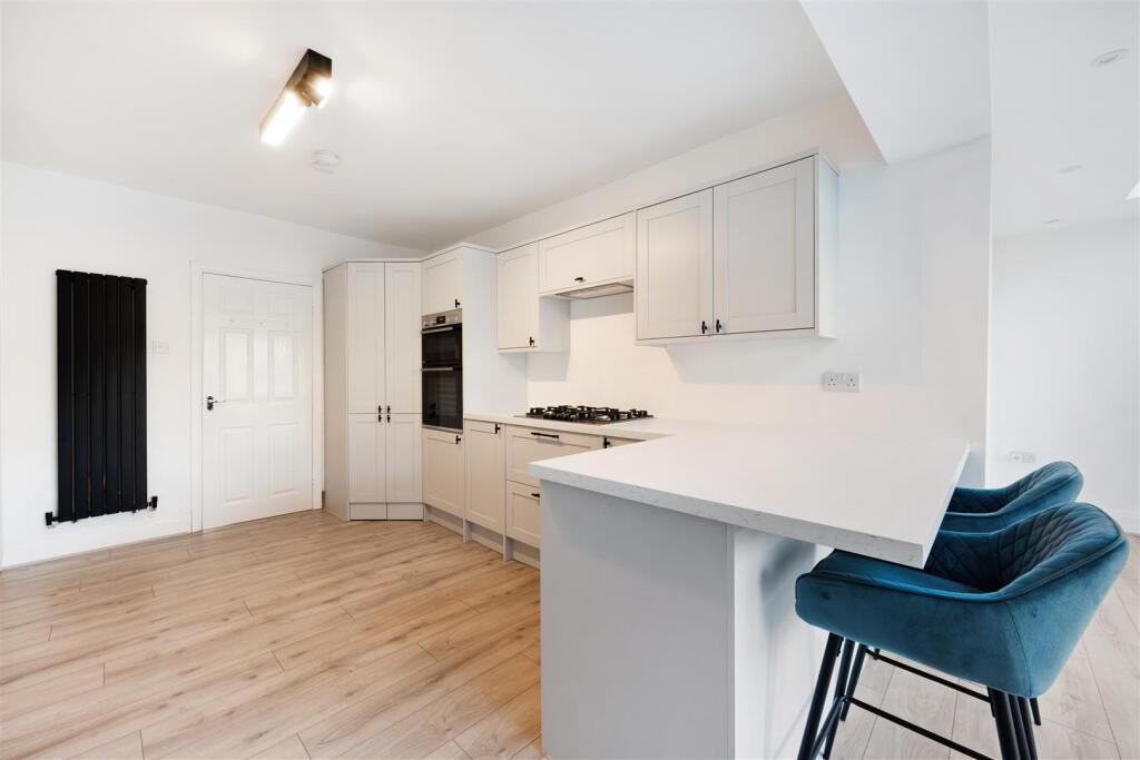 Kitchen opening into