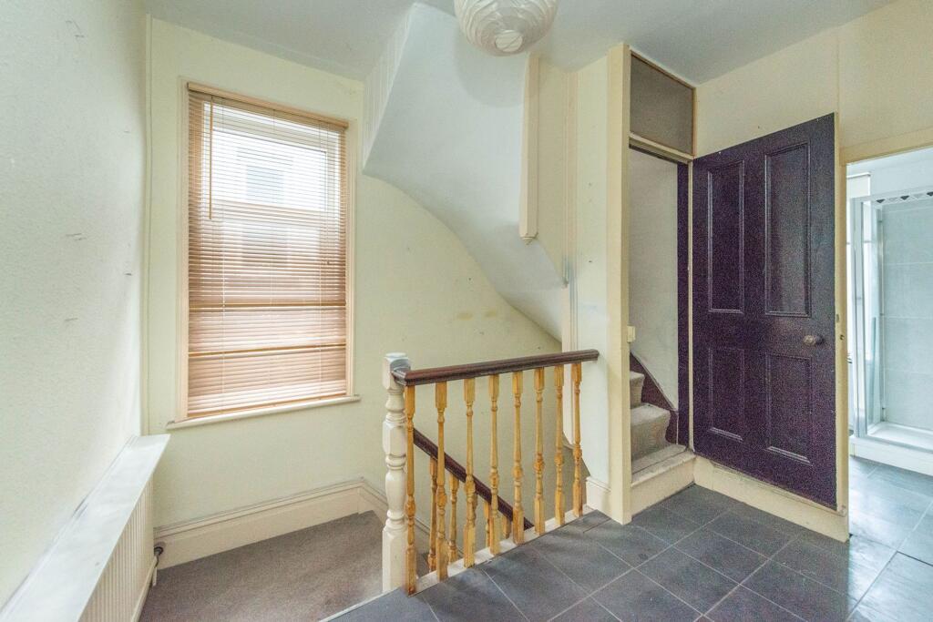 ENTRANCE HALLWAY AND LANDING