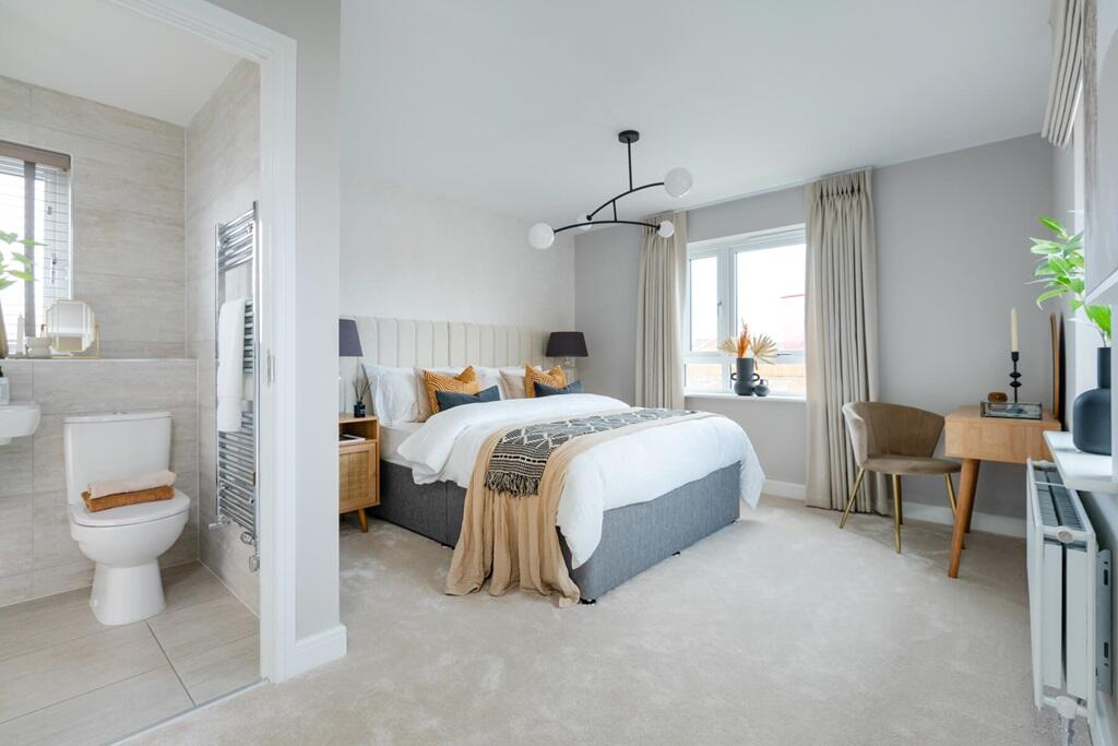 The main bedroom is complete with an ensuite shower room