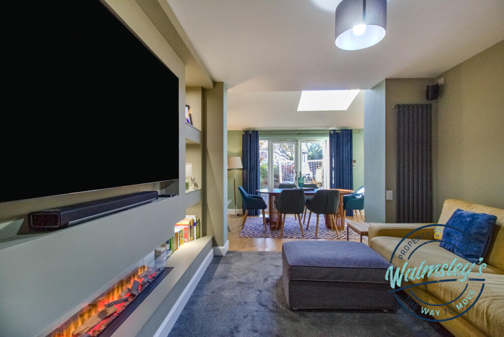 Media room &amp; dining area beyond