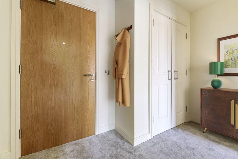 Entrance hall with storage cupboard