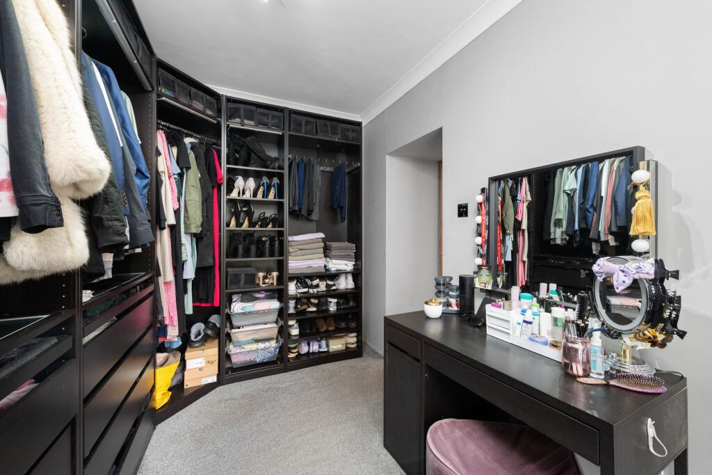 Bedroom One - Walk In Wardrobe