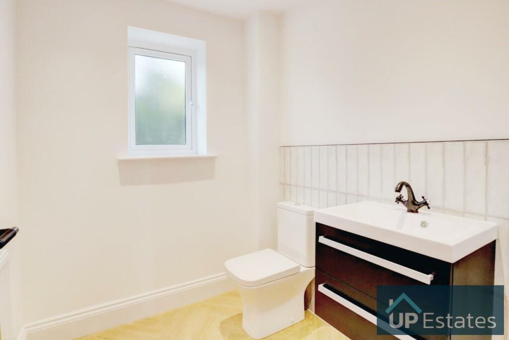 Downstairs WC Cloaks