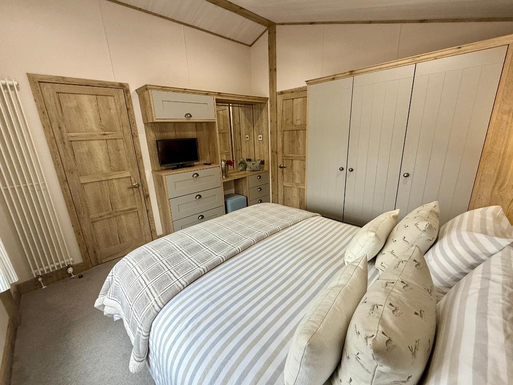 Bedroom 1 showing fitted wardrobes