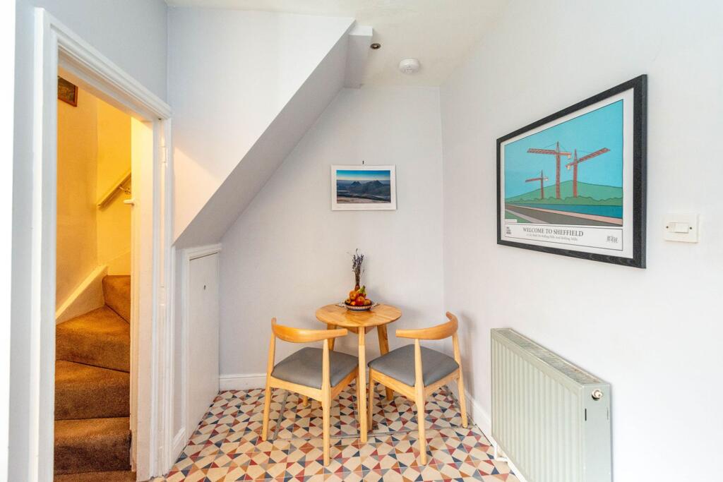 SITTING ROOM AND DINING KITCHEN