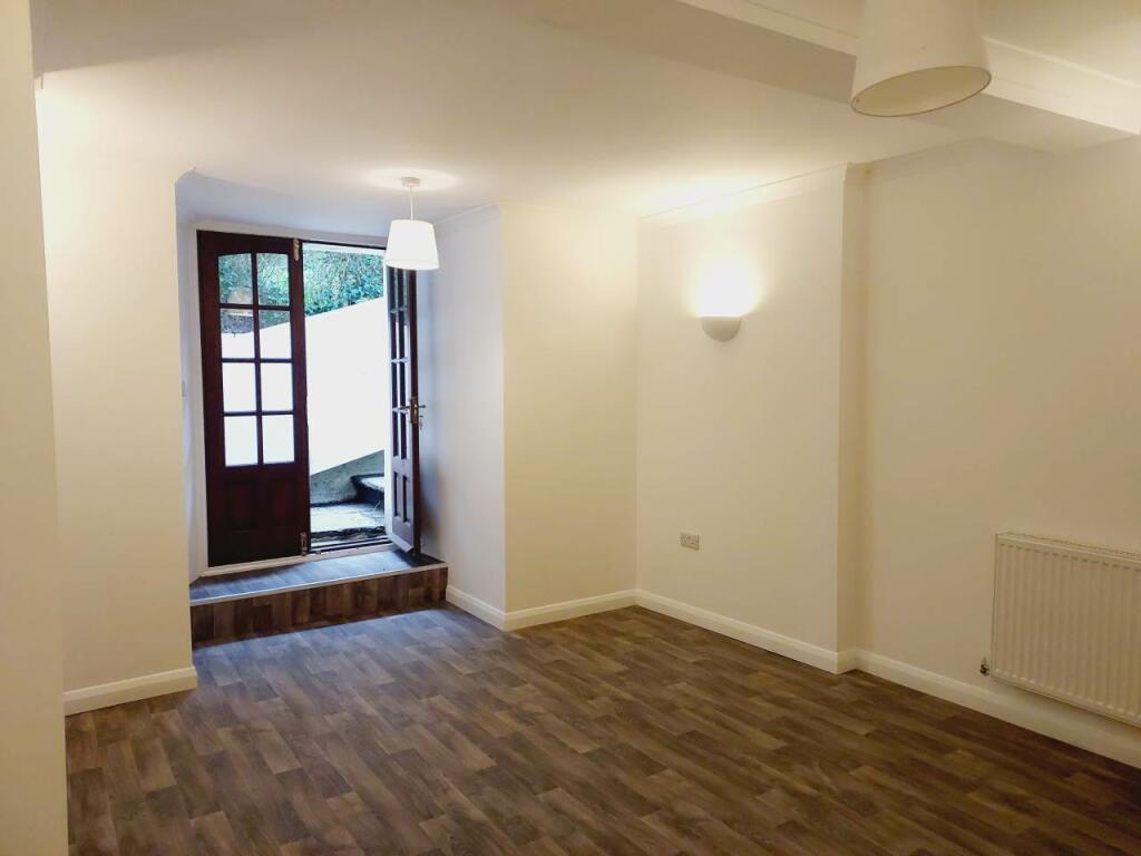 Room with doors to g