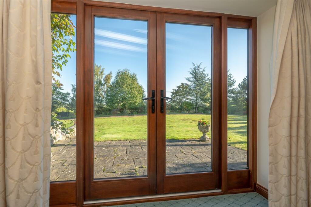 Doors leading to Sun Terrace and Garden