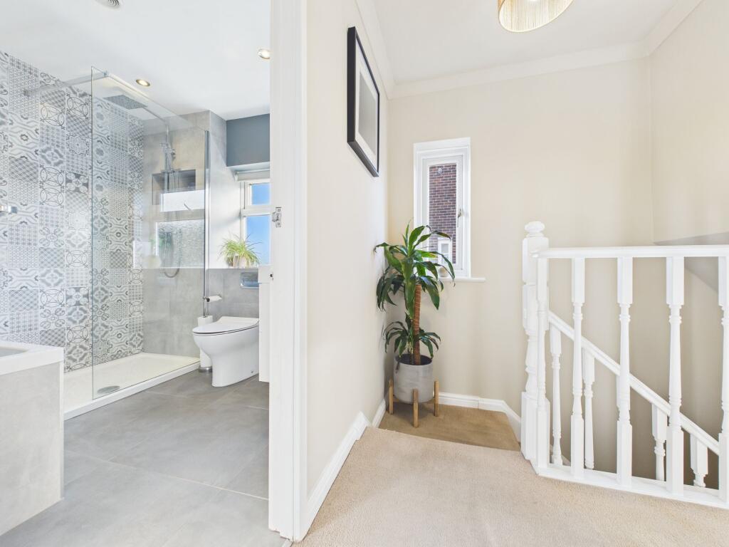 First Floor Landing into Bathroom