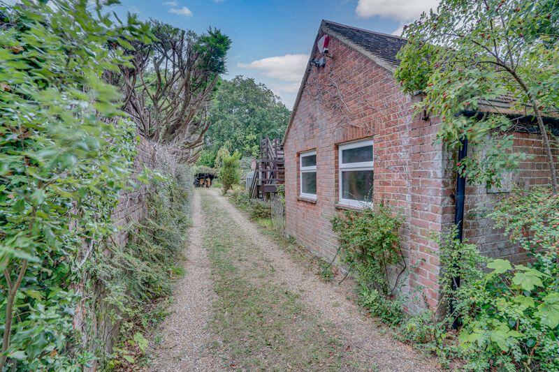 Rear Driveway Leading to Double Garage 