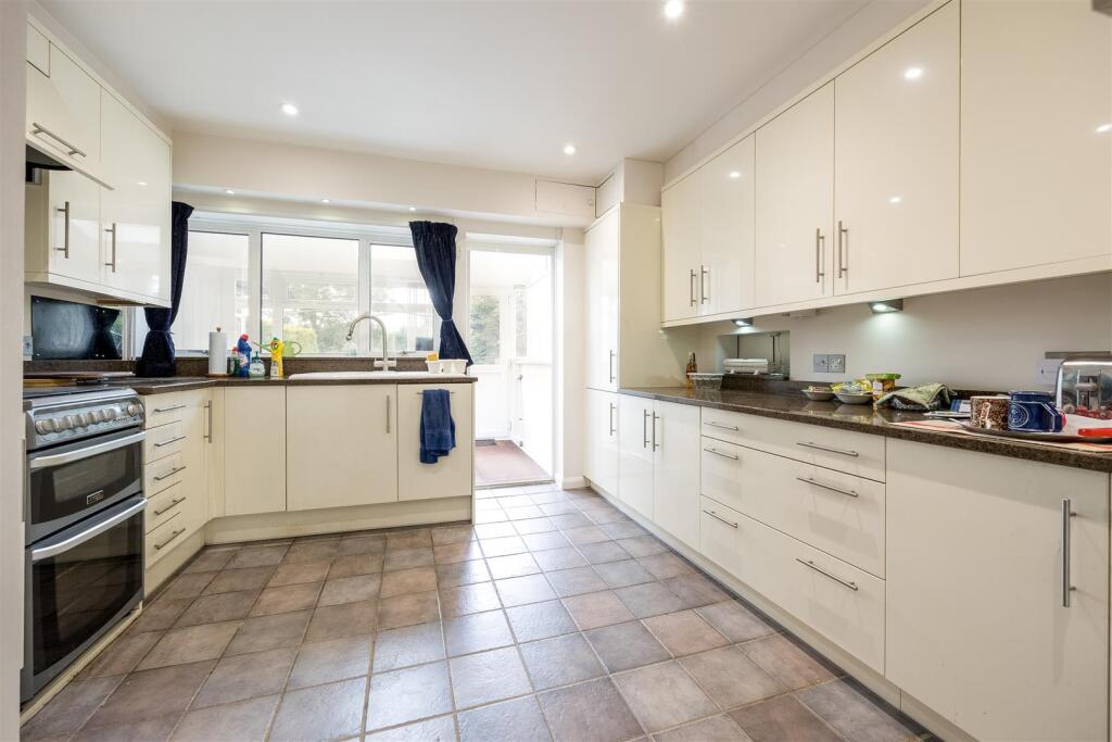 Ample modern kitchen, utility behind