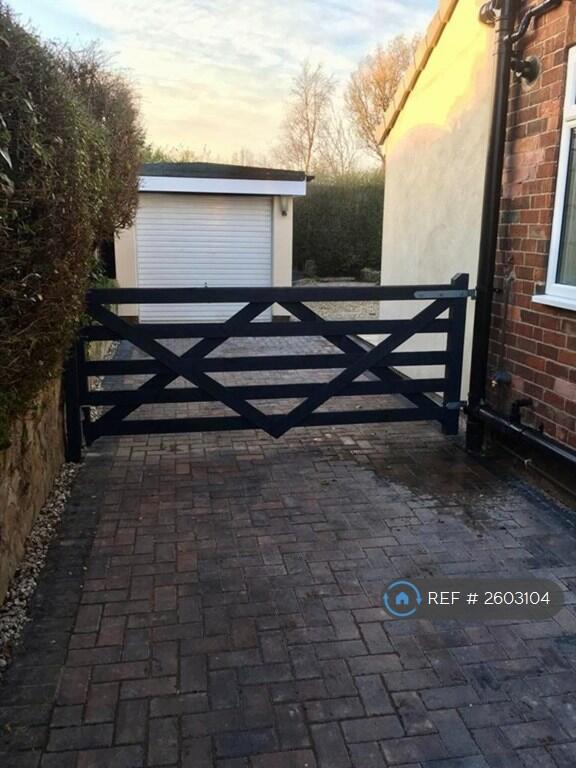 Gated Drive And Garage 