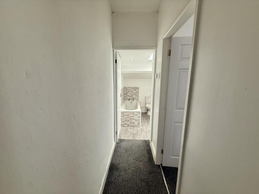 Hallway to bathroom