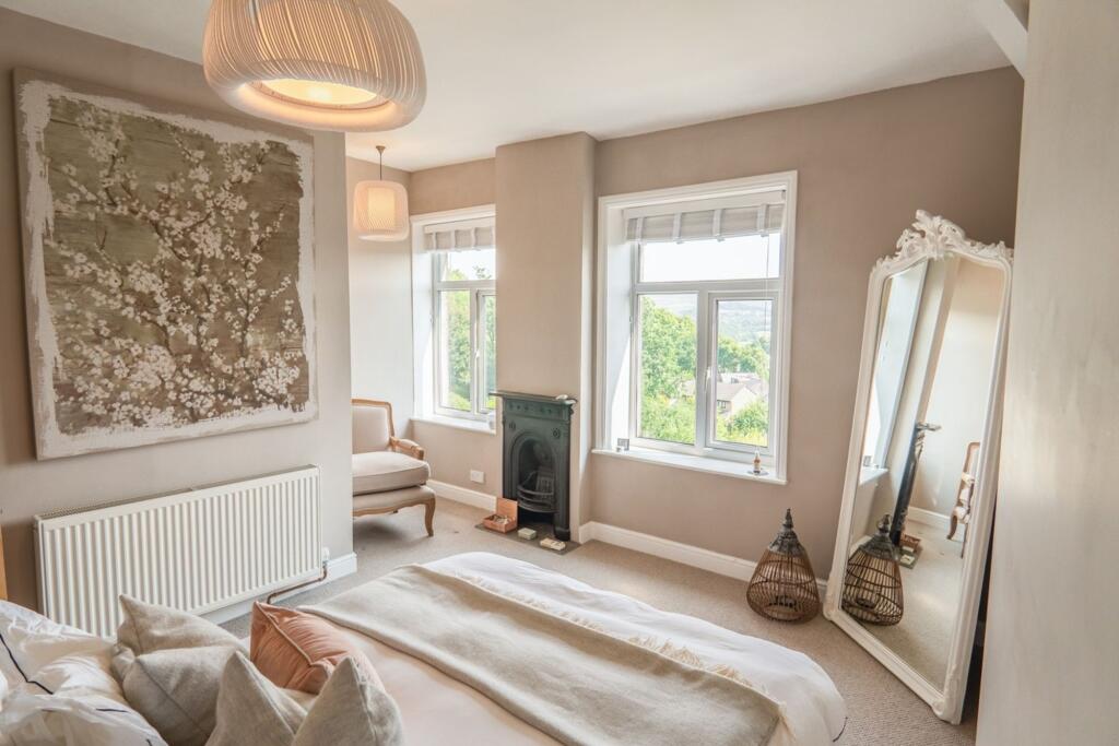 Spacious and Serene Master Bedroom