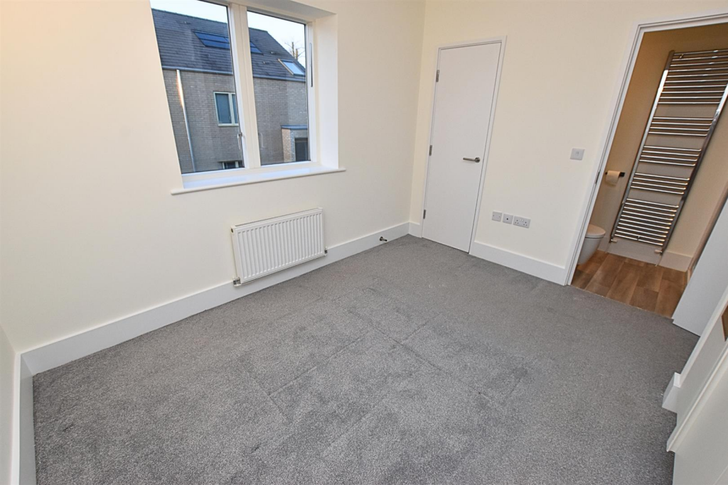 BEDROOM ONE (FRONT)