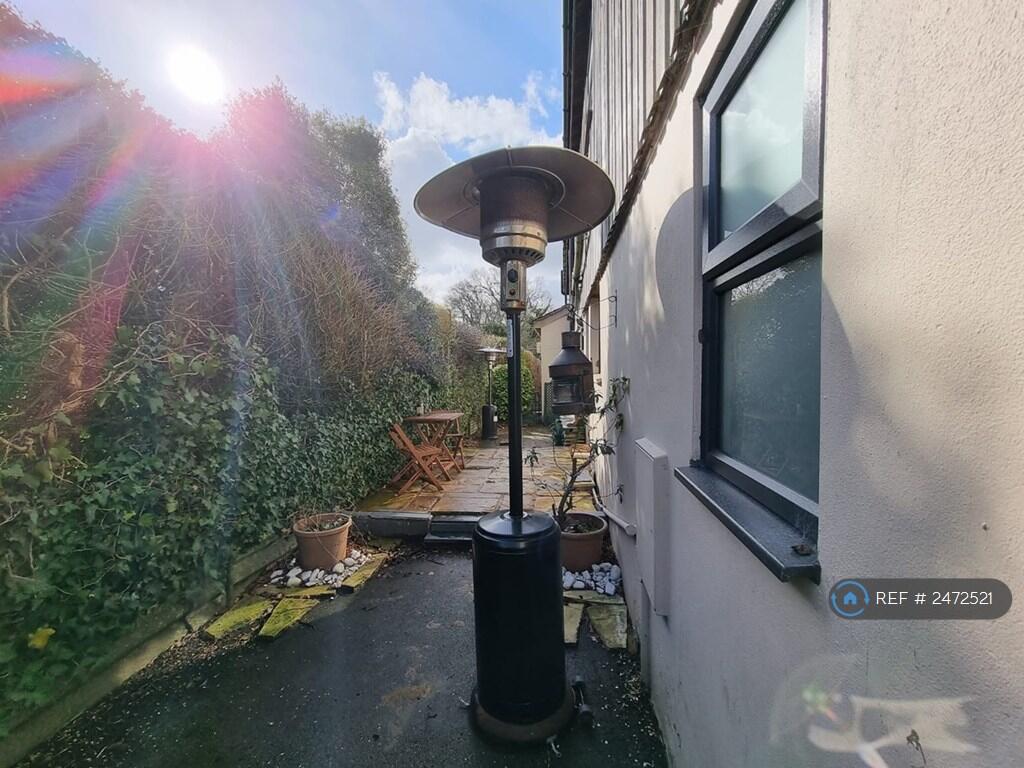 Courtyard Garden: Heater &amp; Table Not Included