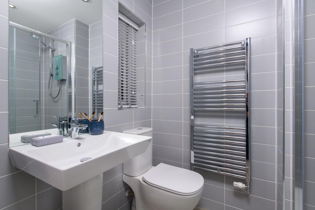 En suite shower room in The Abbeydale 3 bedroom Show Home