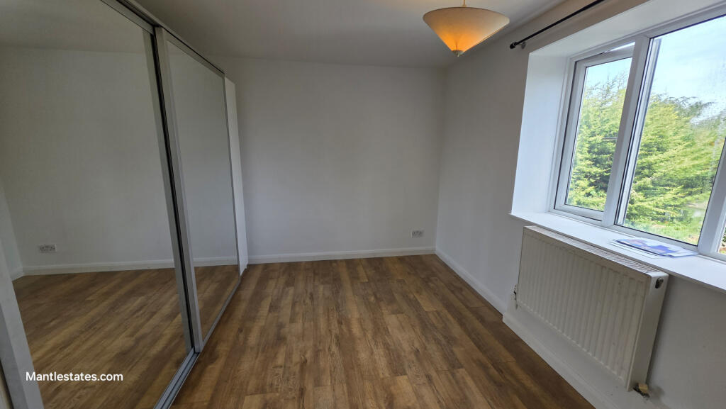 REAR BEDROOM