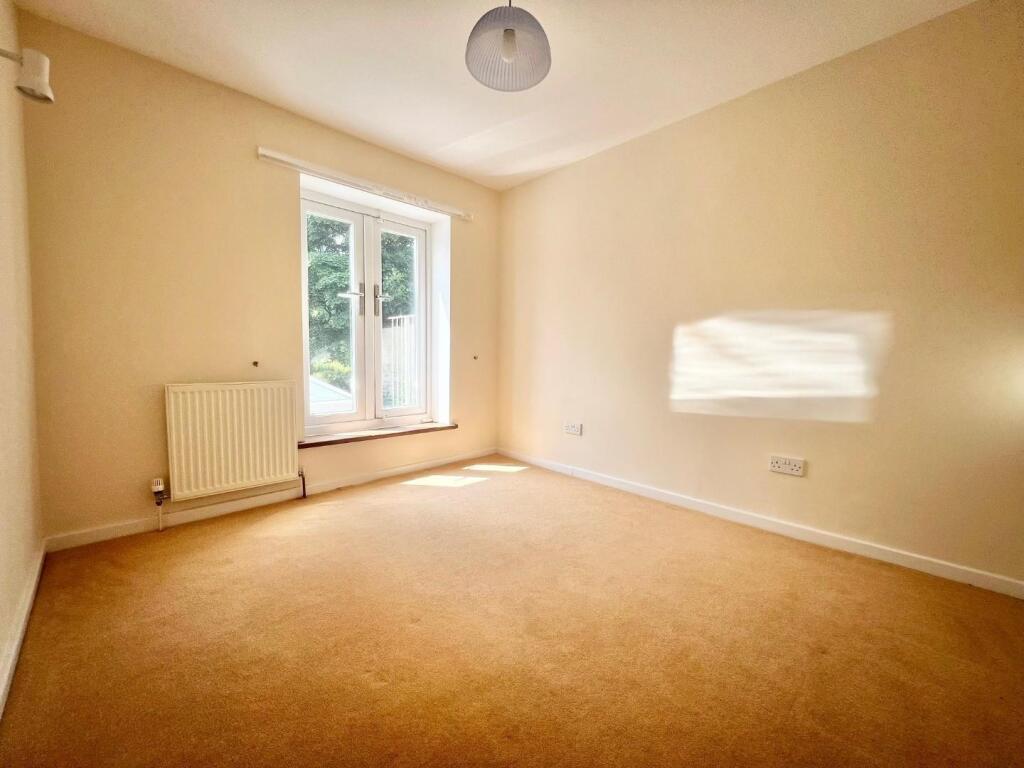 bedroom with french doors.jpg