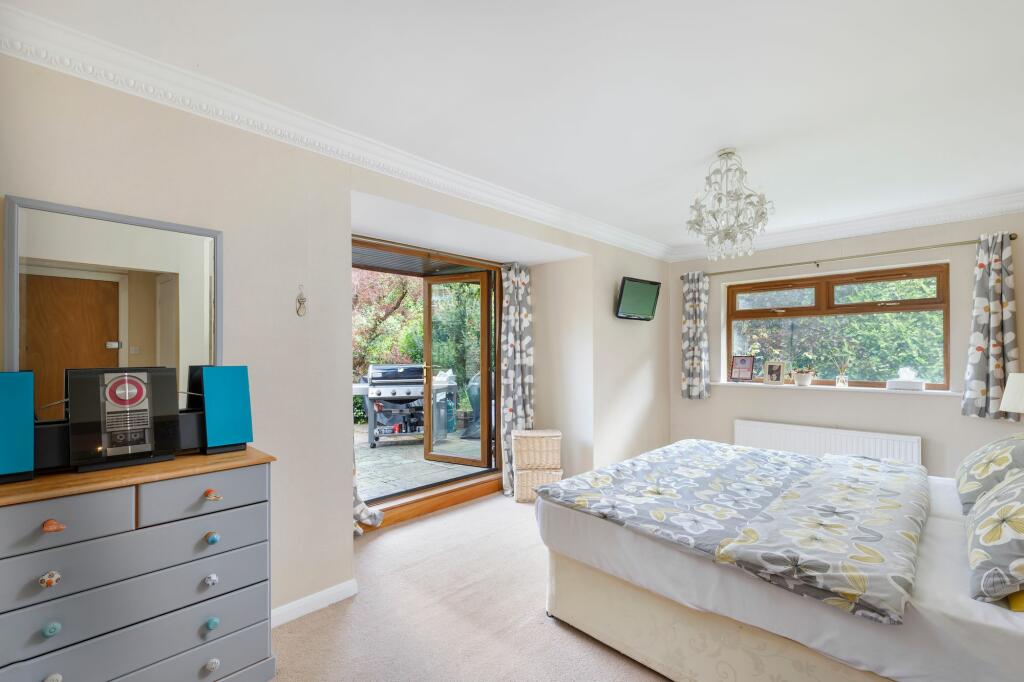 Bedroom 3 with patio access