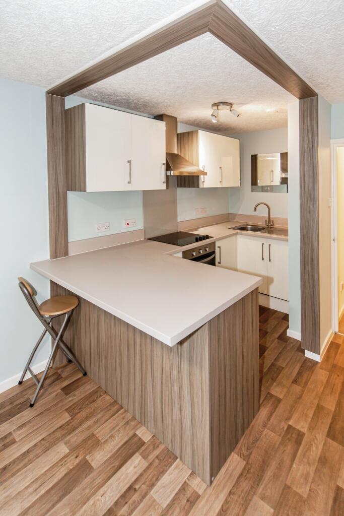 Kitchen area with breakfast bar