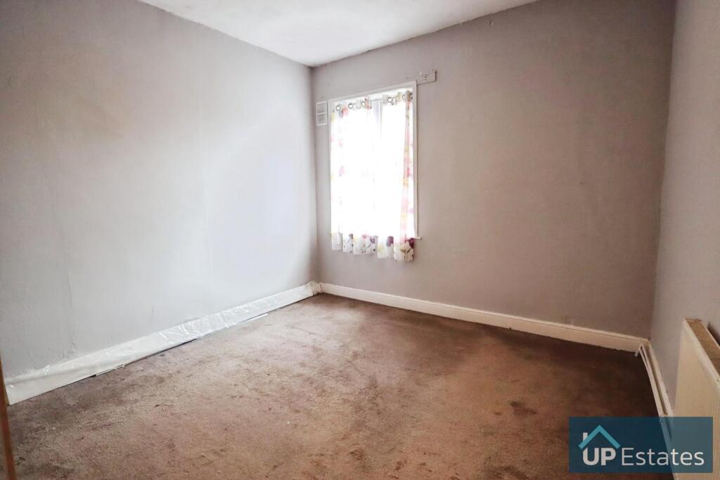 SECOND BEDROOM