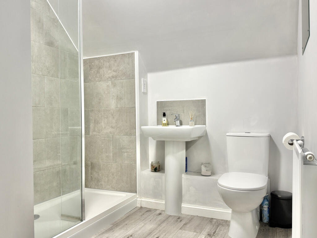 Bathroom with white suite