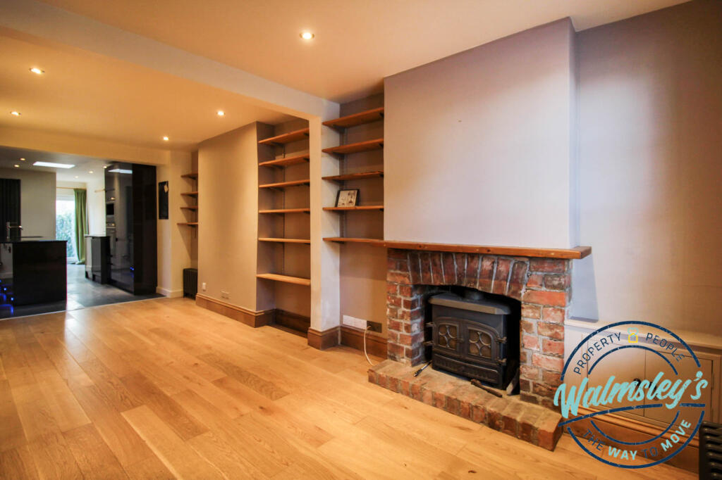 Log burner &amp; shelving