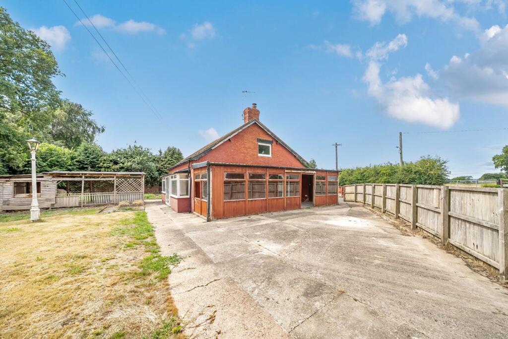 View of property and outbuildings.jpg