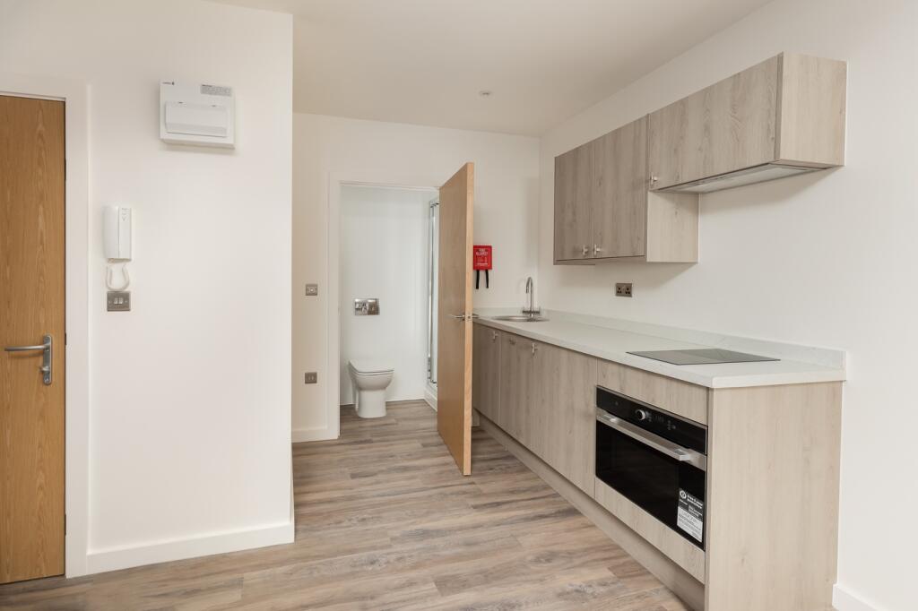 A modern and well-maintained kitchen with ample...