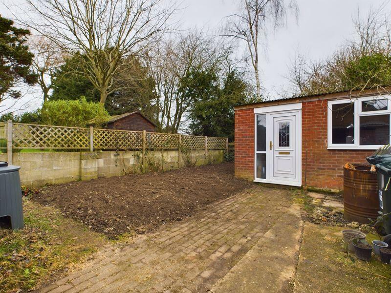 Side Garden (N) and outbuilding 
