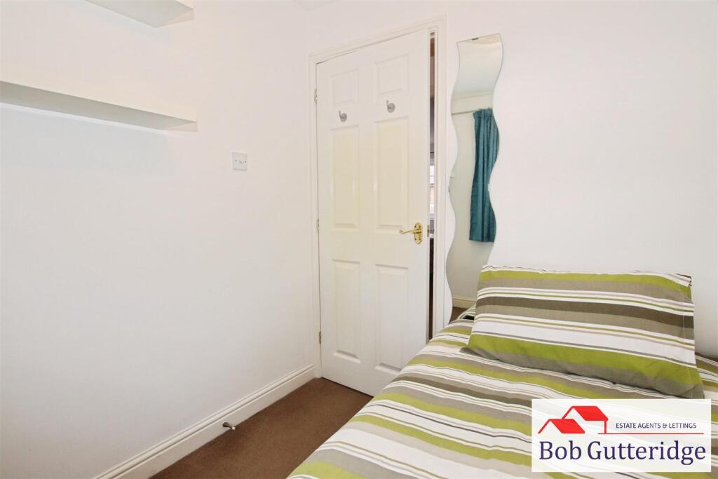 BEDROOM THREE (REAR)