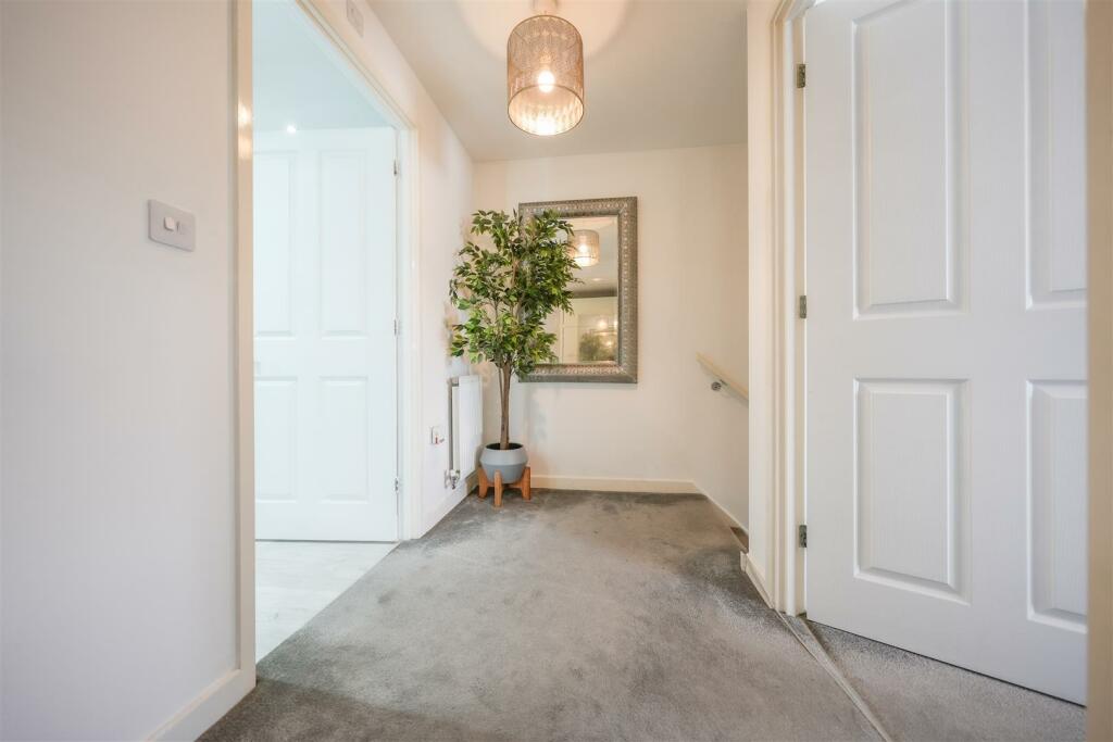 FIRST FLOOR LANDING