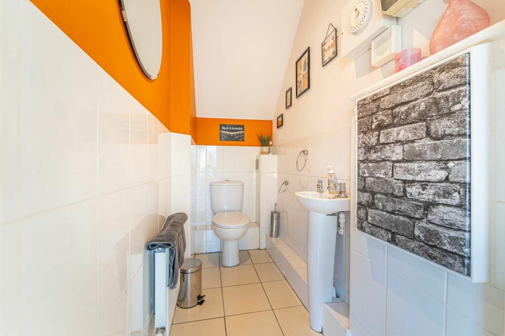Cloaks/ downstairs WC