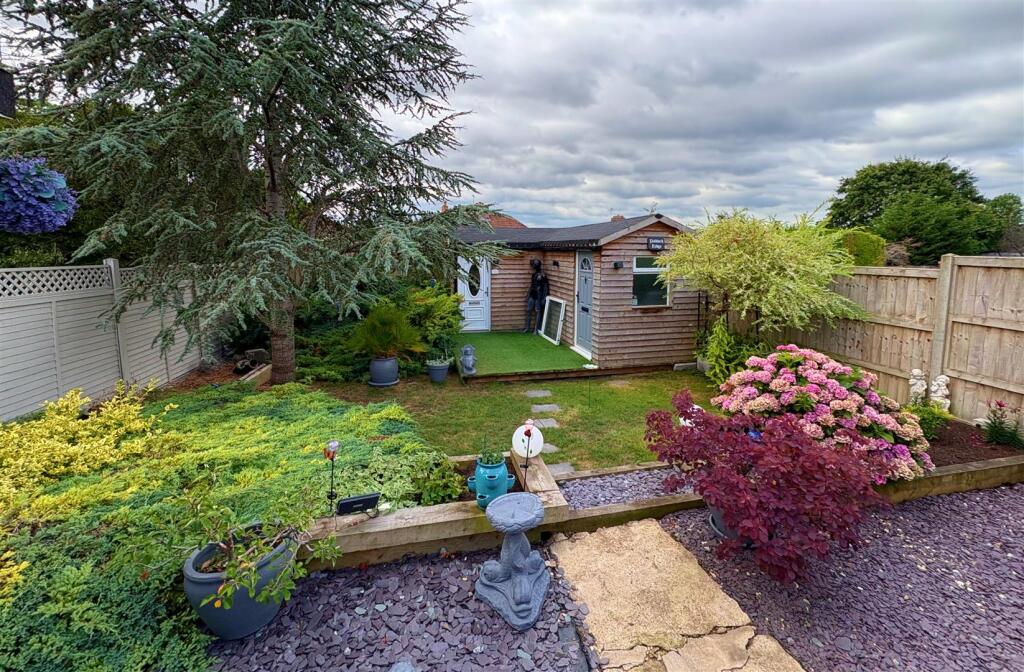 Rear garden and garden room.jpg