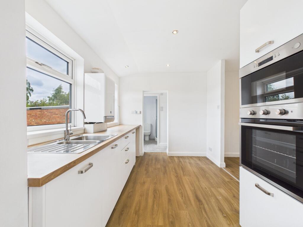 Kitchen through to Shower-Room