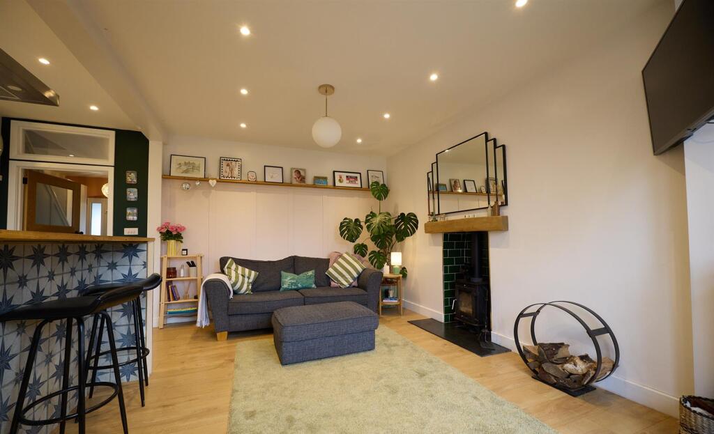 OPEN PLAN LIVING, DINING AND REFIITTED KITCHEN