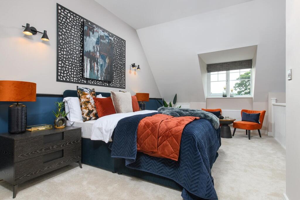 The impressive en suite bedroom occupies the entire top floor