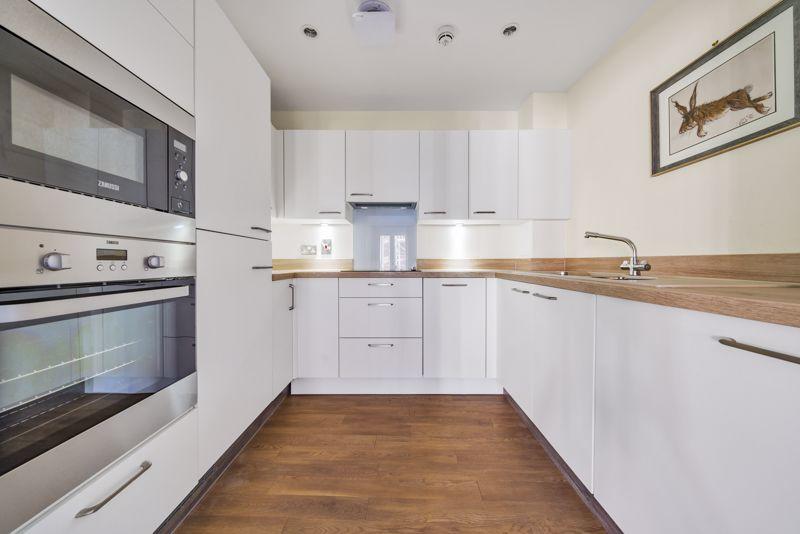 Kitchen with built-in appliances