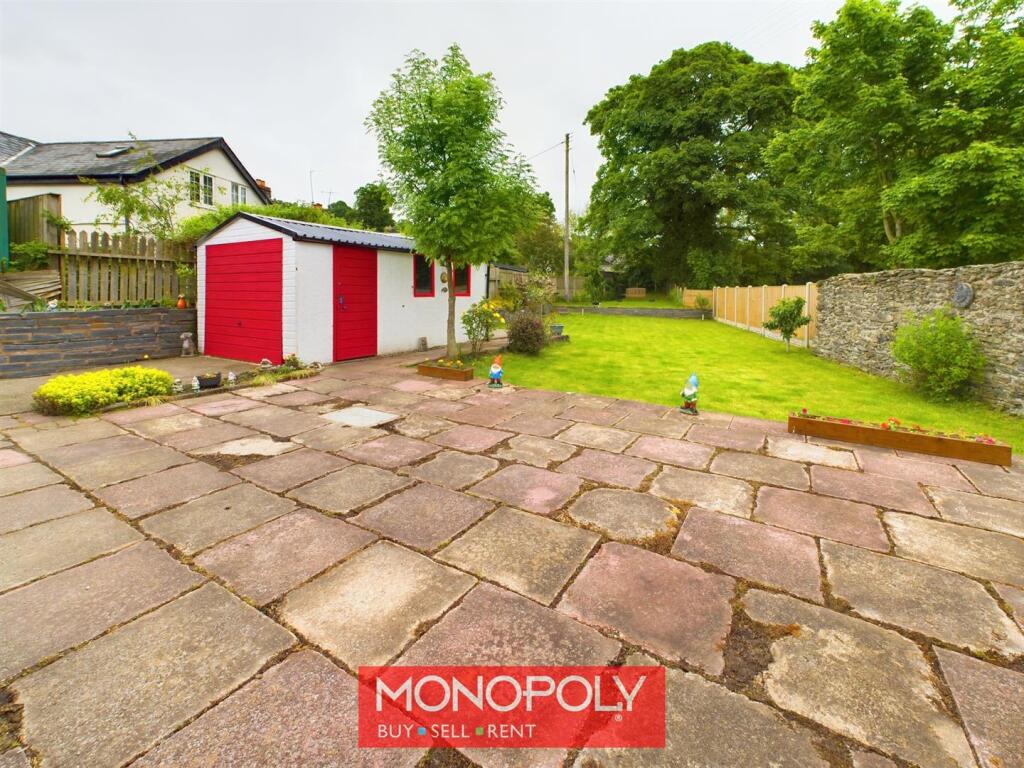 Patio Area And Garage