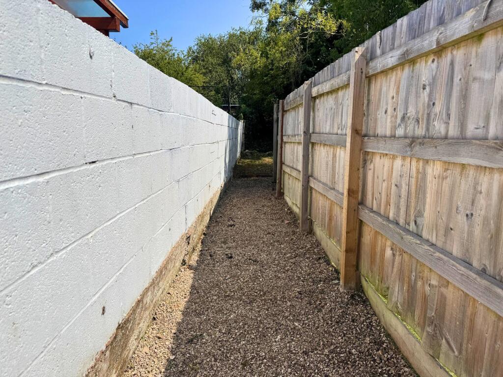 Walkway to rear garden