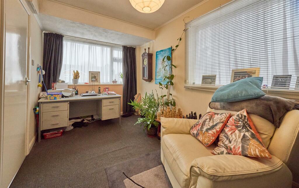 FAMILY ROOM/STUDY TO FRONT