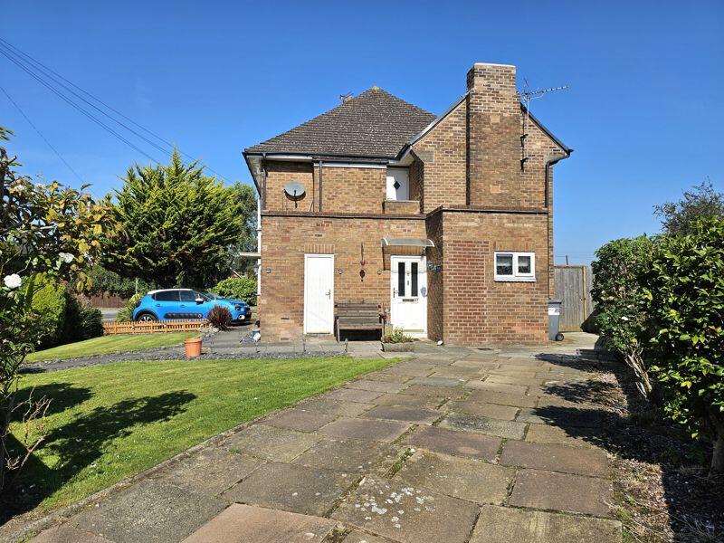 Driveway &amp; Side Elevation