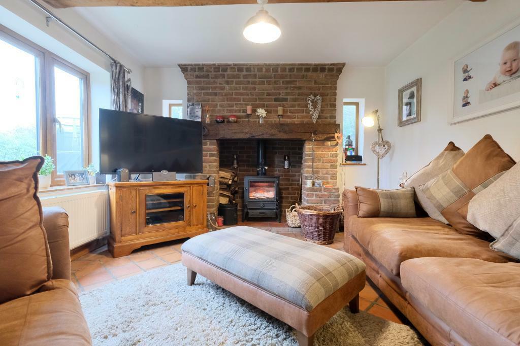 Sitting room with cosy log burner