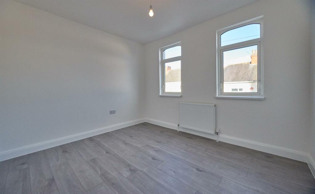 BEDROOM TWO TO FRONT