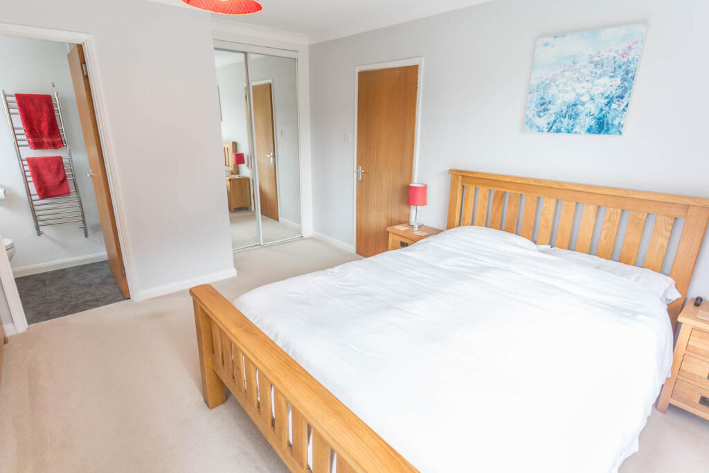 Bedroom 1 with wardrobes