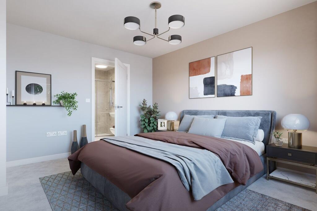 The main bedroom is complete with an en suite shower room