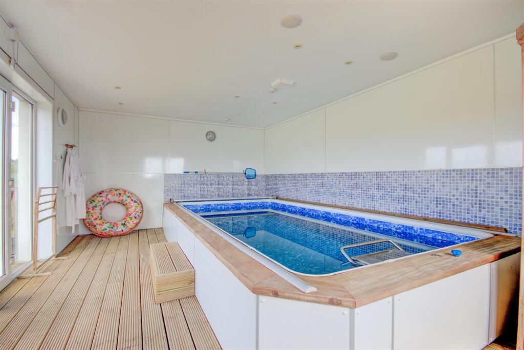 SWIMMING POOL &amp; EXERCISE ROOM
