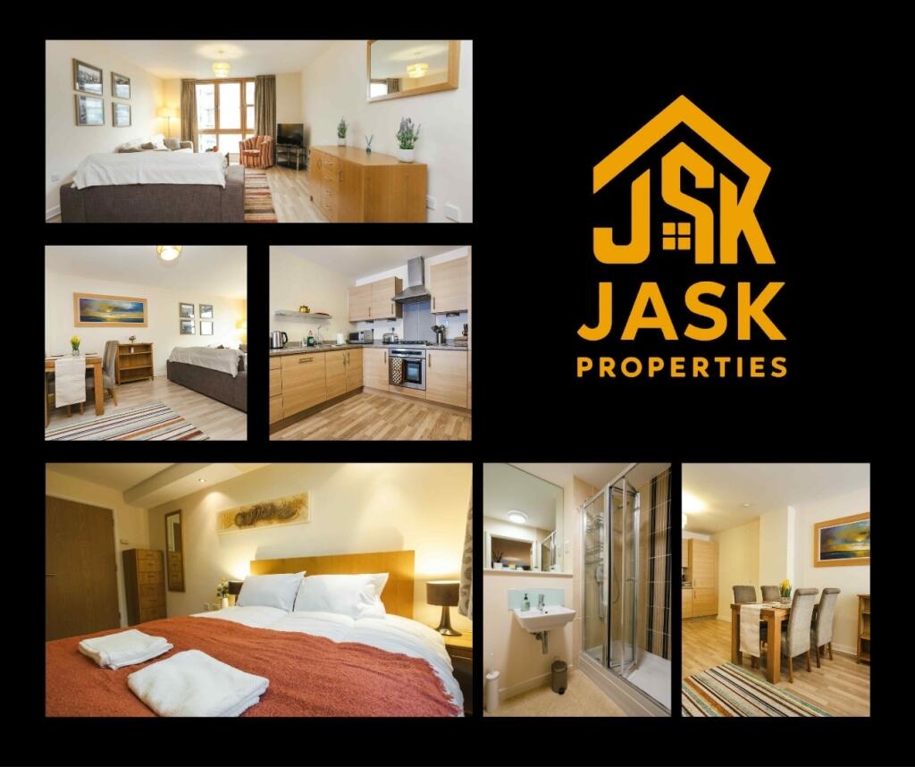 A bright and spacious master bedroom with a com...