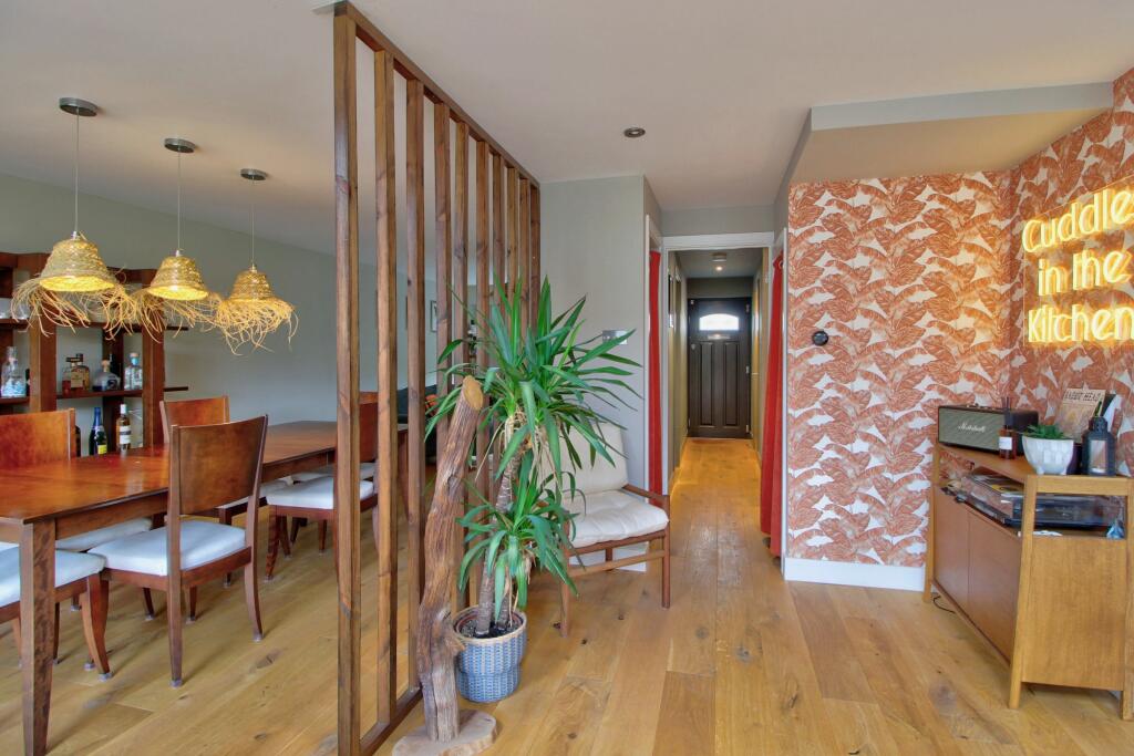 Walnut partition to create soft zones