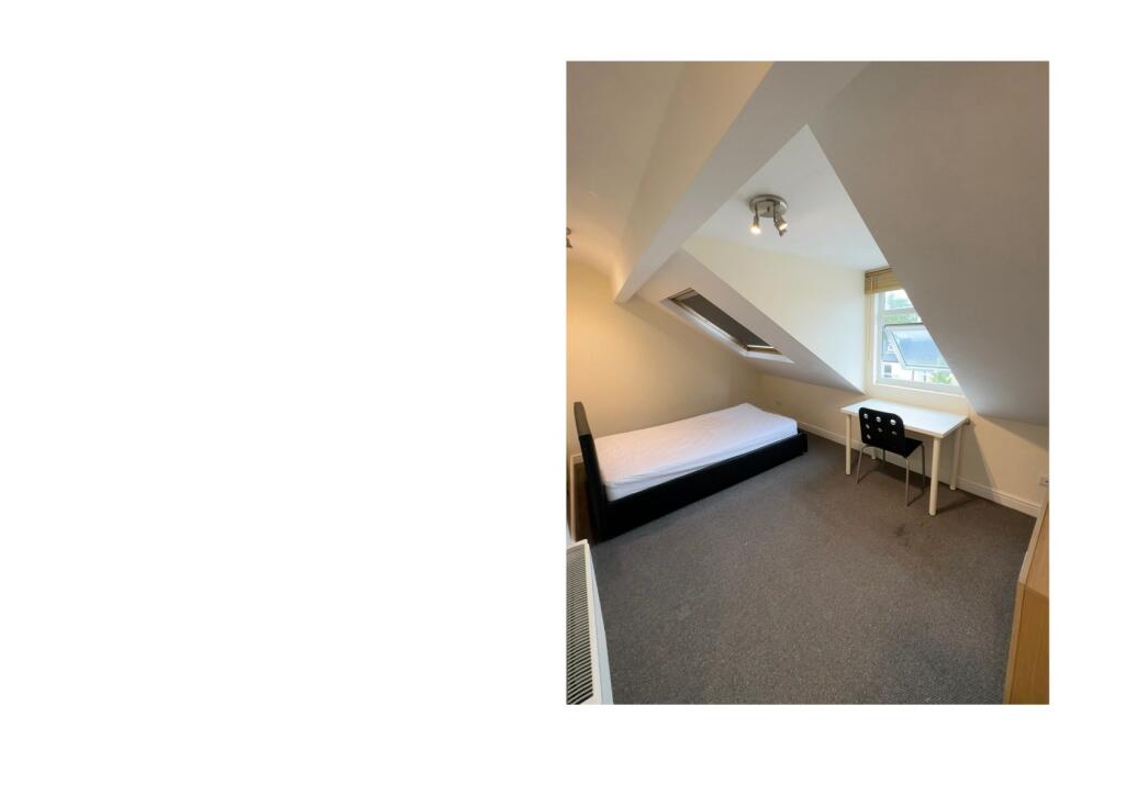 A neatly arranged single bedroom with a comfort...